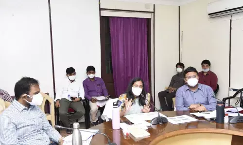 Collector Nagalakshmi Selvarajan reviewing implementation of government flagship programmes in Anantapur on Wednesday