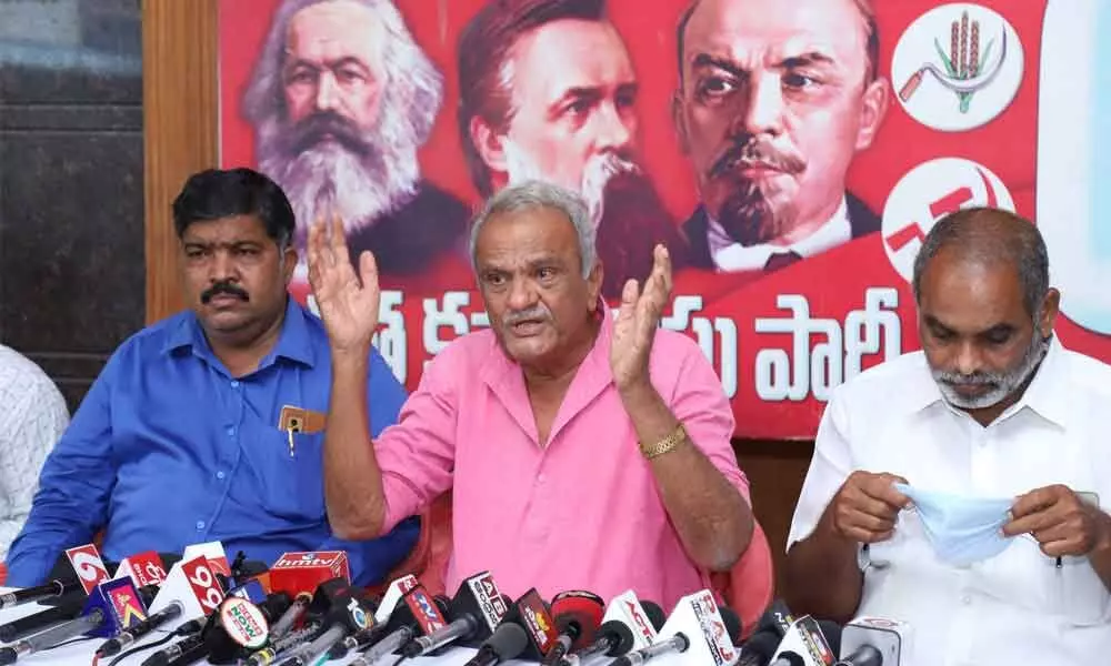 CPI national secretary K Narayana addressing the media in Tirupati on Thursday