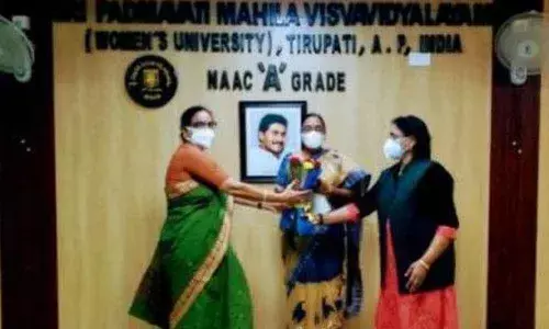 SPMVV V-C Prof D Jamuna and Registrar Prof DM Mamatha congratulating the new Rector Prof D Sarada on Thursday.