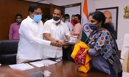 Ministers Errabelli Dayakar Rao and  V Srinivas Goud with a top official of Ministry of Tourism in Delhi on Thursday