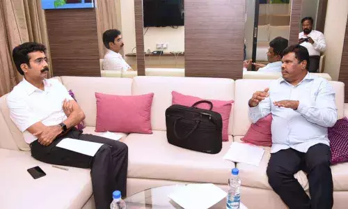 Special Chief Secretary to Industries and Commerce R KarikalValaveen meeting with Collector D Muralidhar Reddy in Kakinada on Wednesday