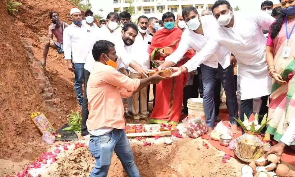 Ministers M Goutham Reddy and P Anil Kumar Yadav laying foundation for the construction of BC Bhavan at Kondayapalem gate in Nellore