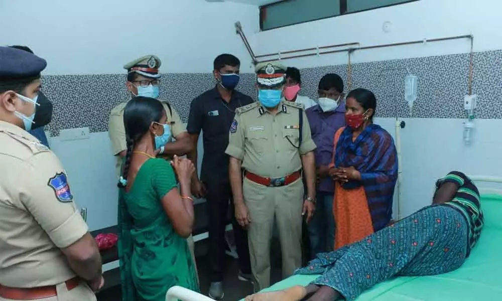 DGP M Mahender Reddy interacting with Mariyamma’s son Uday Kiran and daughters at a private hospital in Khammam