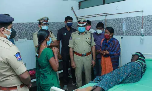 DGP M Mahender Reddy interacting with Mariyamma’s son Uday Kiran and daughters at a private hospital in Khammam