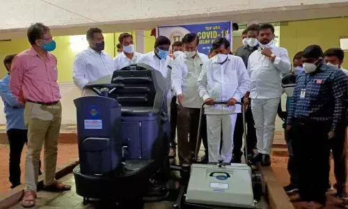 Energy Minister G Jagadish Reddy inaugurating cleaning machines worth Rs 10 lakh, donated by TDF of Astrin of US to the medical college in Suryapet