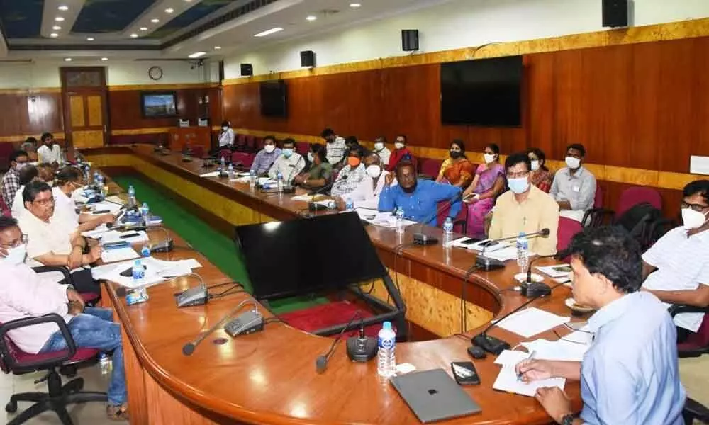 Advisor (Infrastructure) to the School Education Department A Murali speaking at a review meeting in Visakhapatnam on Monday