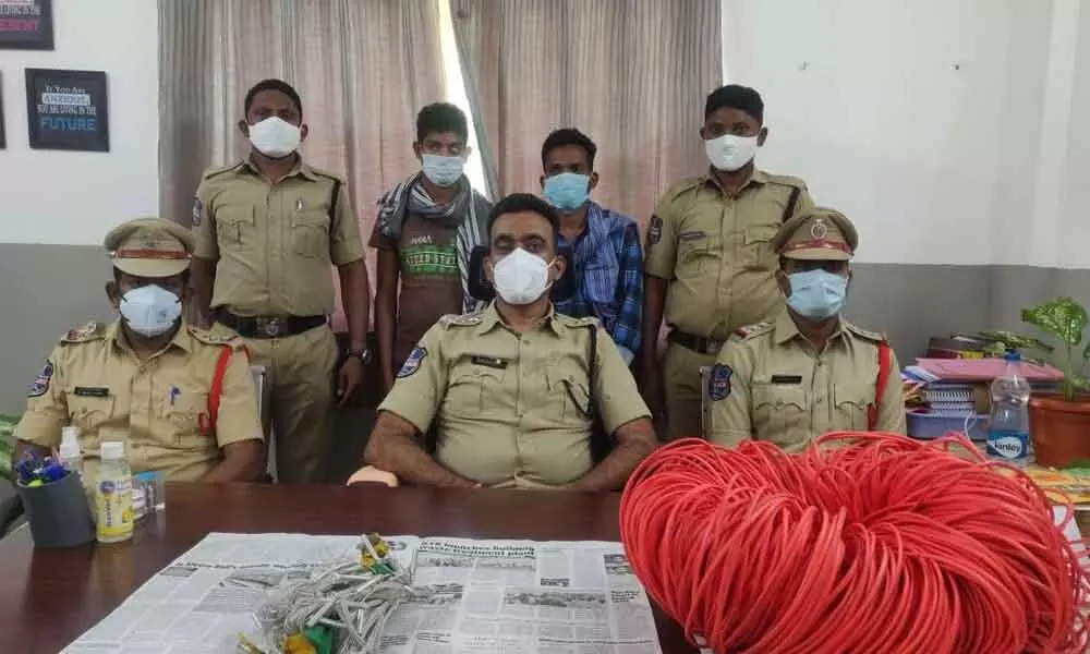 Kothagudem DSP G Venkateswara Babu producing the arrested Maoist militia members before the media at his office in Kothagudem on Monday