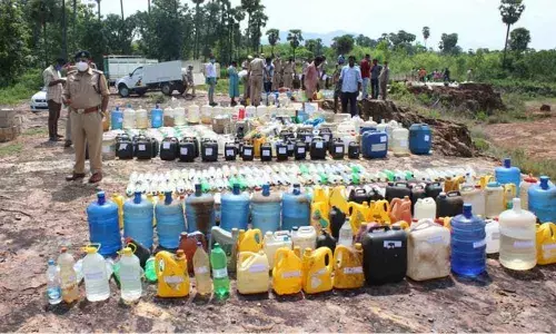 Stocks of ID arrack seized by Visakhapatnam district police kept ready for destruction