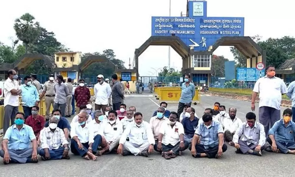 Trade union representatives staging a protest at the main gate of VSP on Tuesday in Visakhapatnam