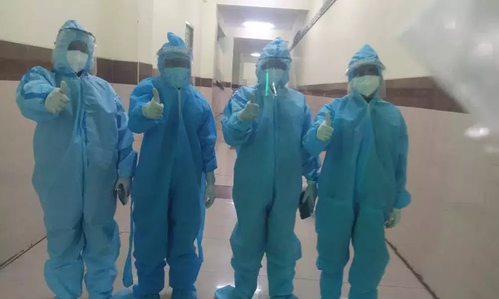 Despite their challenges, women doctors in PPE kits show thumbs up in Visakhapatnam