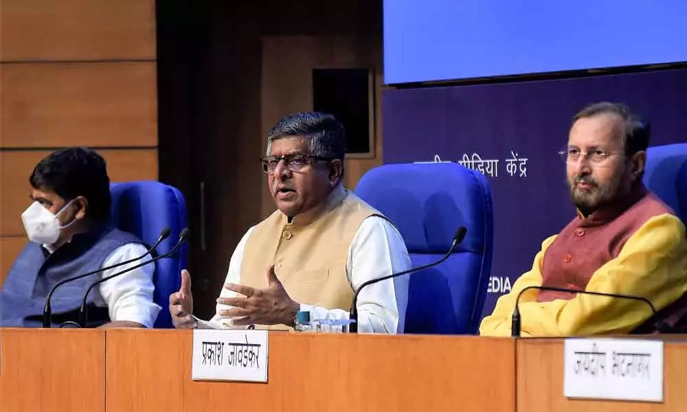 Union Ministers Prakash Javadekar and Ravi Shankar Prasad address a press briefing on Cabinet and CCEA decisions at National Media Centre in New Delhi on Wednesday