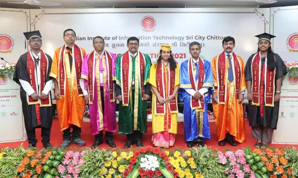 Medallists with the chairman of board of directors of M Balasubramanyam, Sri City MD Ravindra Sanna Reddy and Director Dr G Kannabiran at the IIIT convocation on Wednesday.