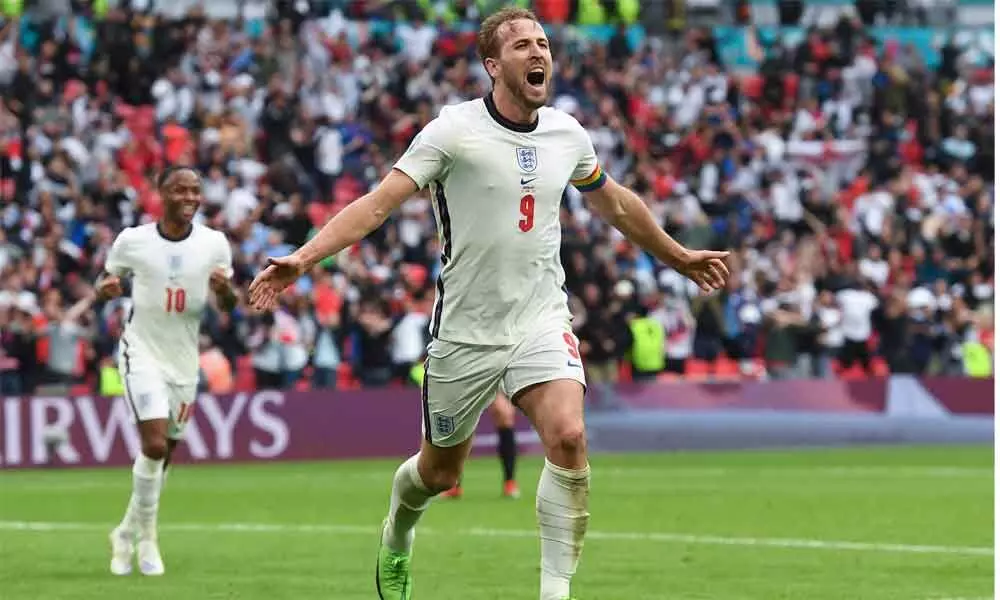 Englands Harry Kane celebrates after scoring his  sides 2nd goal during the Euro 2020 soccer championship round of 16 match between England and Germany