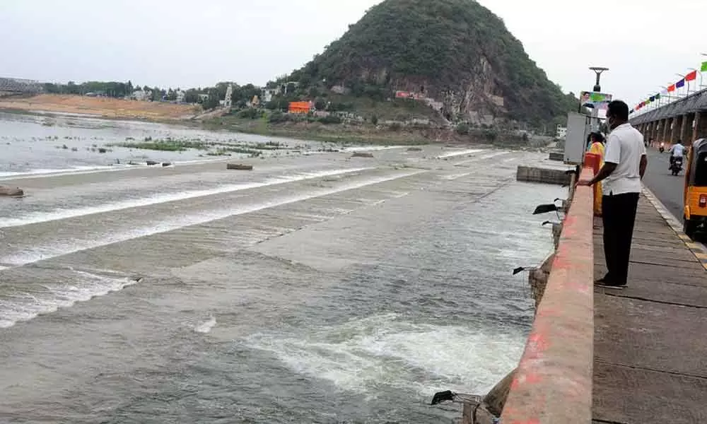 Irrigation authorities release 8,000 cusecs of water from Prakasam barrage on Friday as inflows from Pulichintala continue due to power generation by Telangana Genco