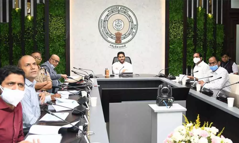 Chief Minister Y S Jagan Mohan Reddy holding  a review meeting on the containment of Covid and vaccination programme at his camp office in Tadepalli on Monday