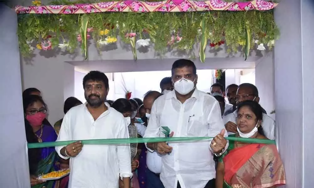 Minister Botcha Satyanarayana inaugurating new floor at Municipal Corporation building in Vizianagaram on Monday