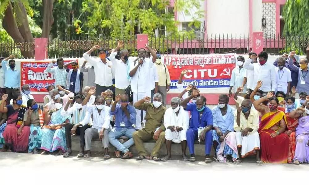 Swachh Bharat Sanitation Workers protesting in front of the Collectorate in Ongole on Monday