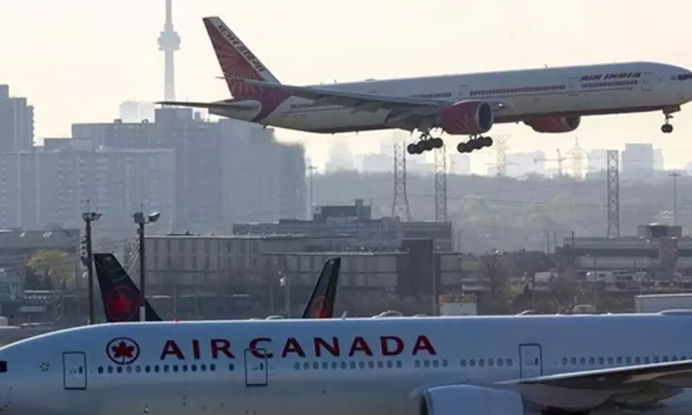 Canada eases travel curbs on citizens, international students