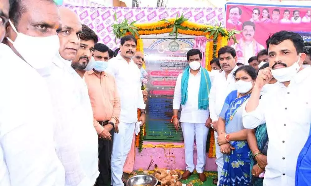 R&B minister Vemula Prashantha Reddy laying foundation stone in Kamareddy on Monday