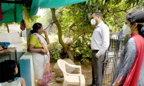 District Collector RV Karnan interacting with the people in Acharlagudem village on Monday