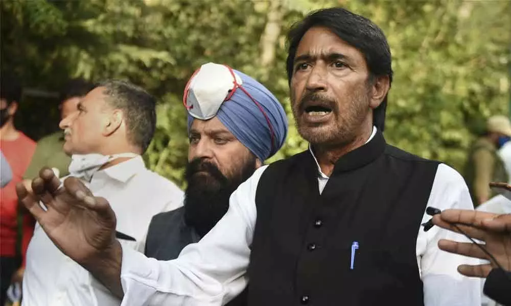 Jammu and Kashmir Congress president Ghulam Ahmad Mir interacts with media after meeting members of Delimitation Commission, in Srinagar on Tuesday