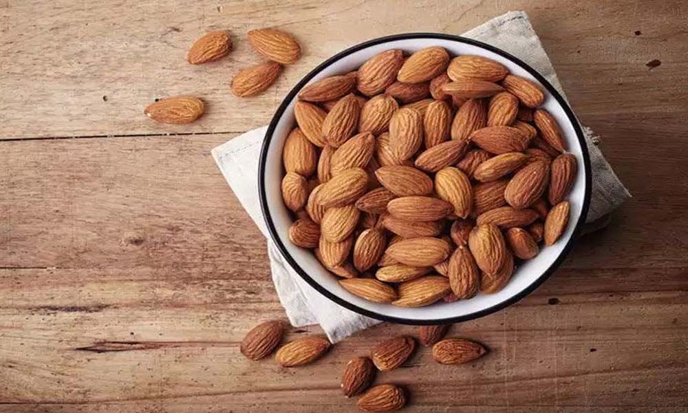 Eat almonds twice daily to cut diabetes, cholesterol risk