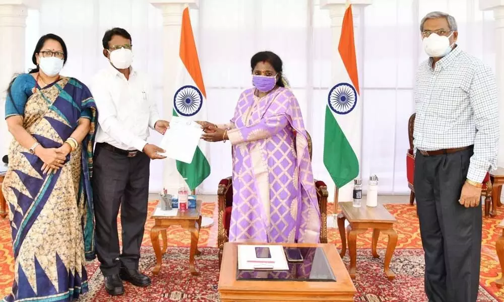 Former SDLCE Director (Kakatiya University) Prof Guguloth Veeranna submitting a memorandum to Governor Tamilisai Soundararajan at Raj Bhavan in Hyderabad on Thursday
