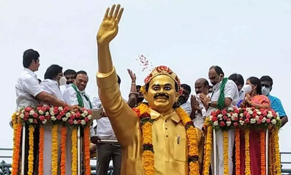 YSRCP leaders paying rich tributes to YS Rajasekhara Reddy by garlanding his statue in Ongole on Thursday