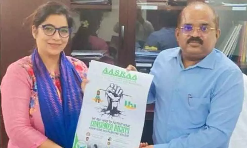 Advocates Association for Social Responsibility and Awareness’s women wing president Karambir Kaur and secretary of Minority Welfare Department A Md Imtiaz releasing the brochure of AASRA in Vijayawada on Wednesday