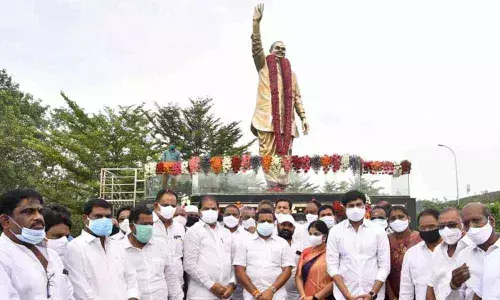 Endowments Minister Vellampalli Srinivasa Rao, Central MLA Malladi Vishnu ,  Mayor Rarana Bhayalashmi , Deputy Mayor B Duga,  Devineni Avinash and paty leaders paying tributes to late Chief Minister Dr Y S  Rajasekhara Reddy to mark this birth anniversary  in Vijayawada on Thursday (Photo: Ch Venkata Mastan)