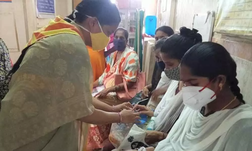 Pregnant women being provided nutritious food by Sri Sathya Sai Seva Organisation at Madhurawada PHC in Visakhapatnam on Saturday