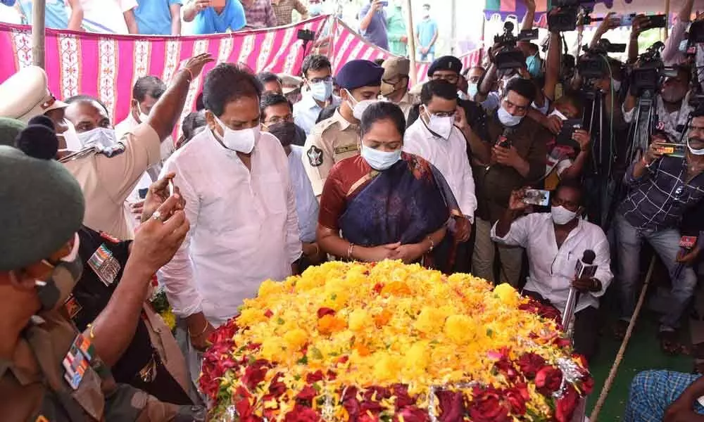 Home Minister M Sucharitha, Dy Speaker Kona Raghupati and others pay tributes to Jaswanth Reddy at his residence before his last journey in Guntur district on Saturday