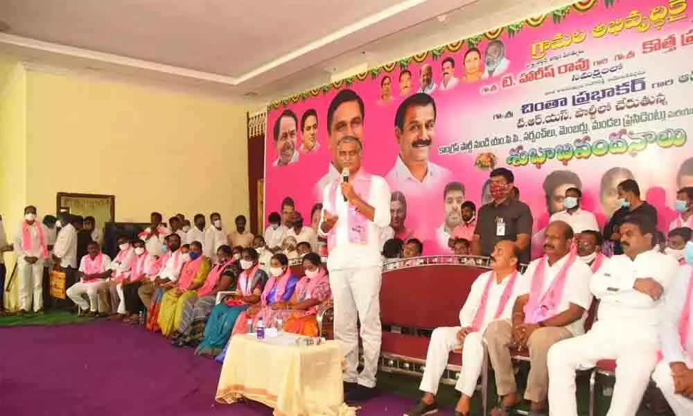 Finance Minister T Harish Rao speaking a public meeting in Sadashivpet in Sangareddy district on Saturday