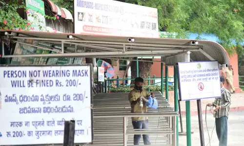 Zoo authroities sanitising the entrance on Saturday