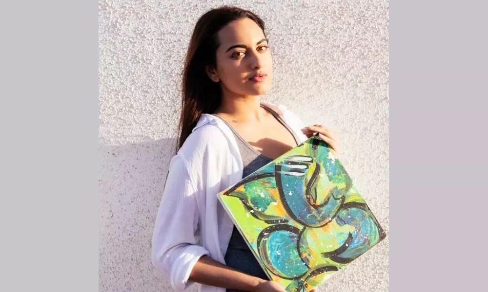 Sonakshi Sinha with her piece of art