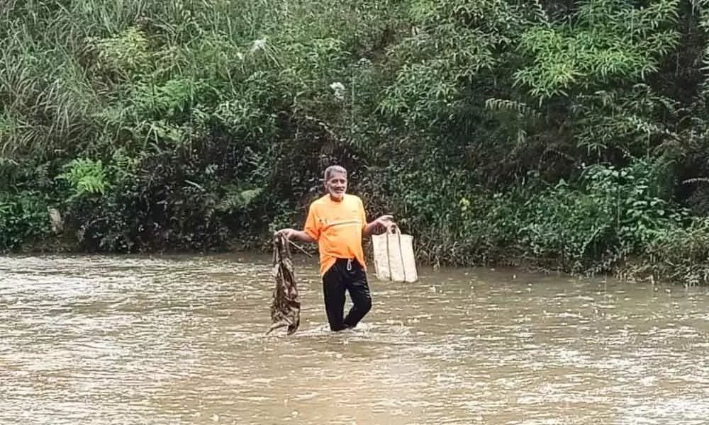 Hassainar (62) a native of  Kottamudi Hodavada cleaned  Cauvery river since April during lockdown