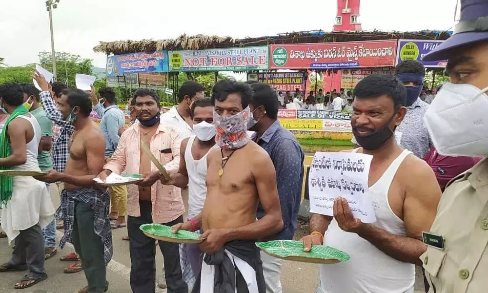 Protestors seeking alms at the Kurmannapalem against privatisation of VSP in Visakhapatnam on Sunday