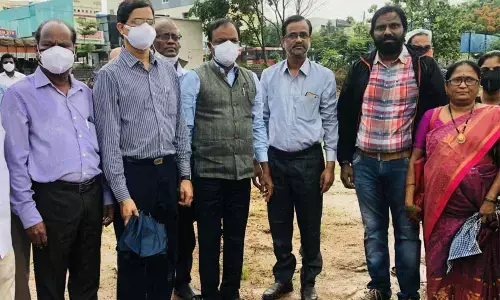 Kakatiya University (KU) Vice-Chancellor Prof Thatikonda Ramesh with SDLCE Director Prof Srinivas Rao at Haritha Haram programme on KU campus in Hanamkonda on Sunday