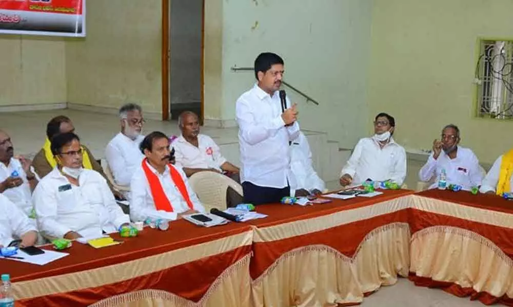 TDP leader Kollu Ravindra addressing the roundtable in Vijayawada on Monday