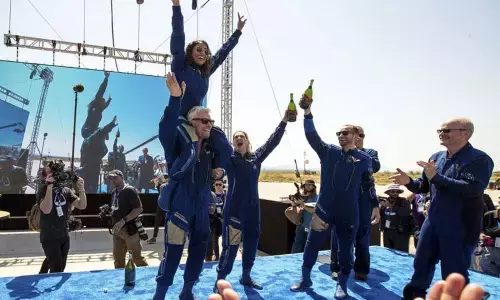 Branson carries Bandla on shoulders after successful space trip