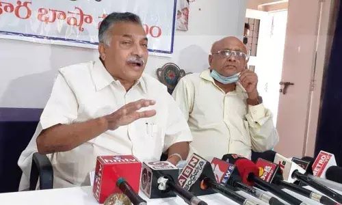 Chairman of  AP Official Language Commission Yarlagadda Lakshmi Prasad addressing  a press conference in Visakhapatnam on Monday