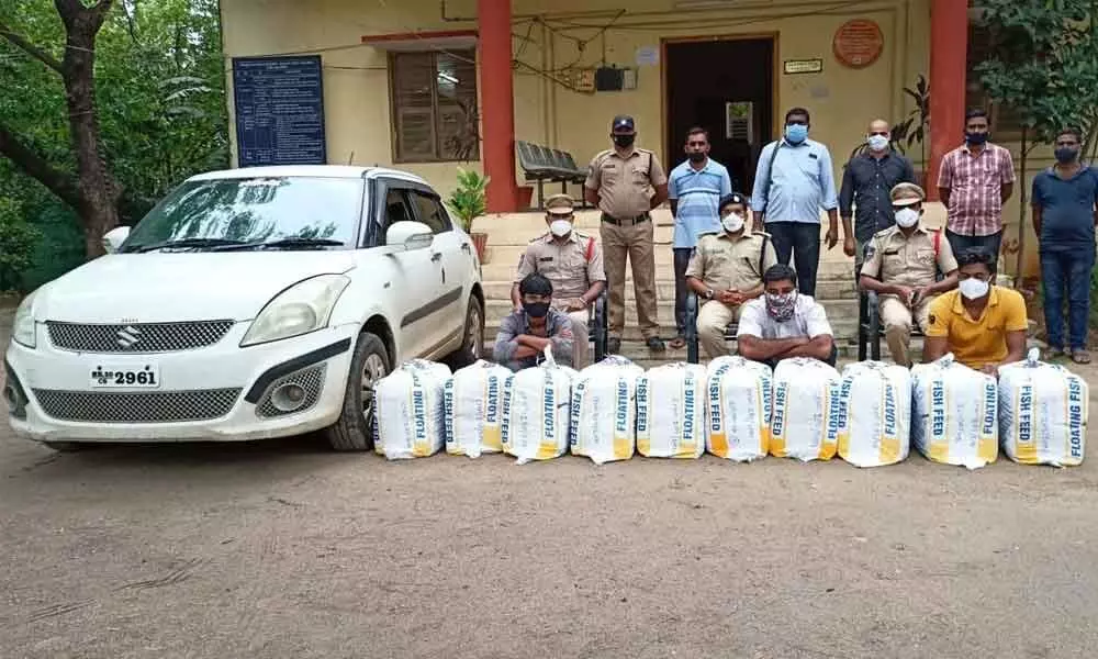 ASP Dr G Vineeth producing seized ganja and arrested persons before the media at office in Bhadrachalam on Tuesday