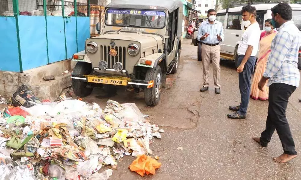 MCT Commissioner P S Girisha inspected the garbage piled up at various places and interacted with people in Tirupati on Wednesday.