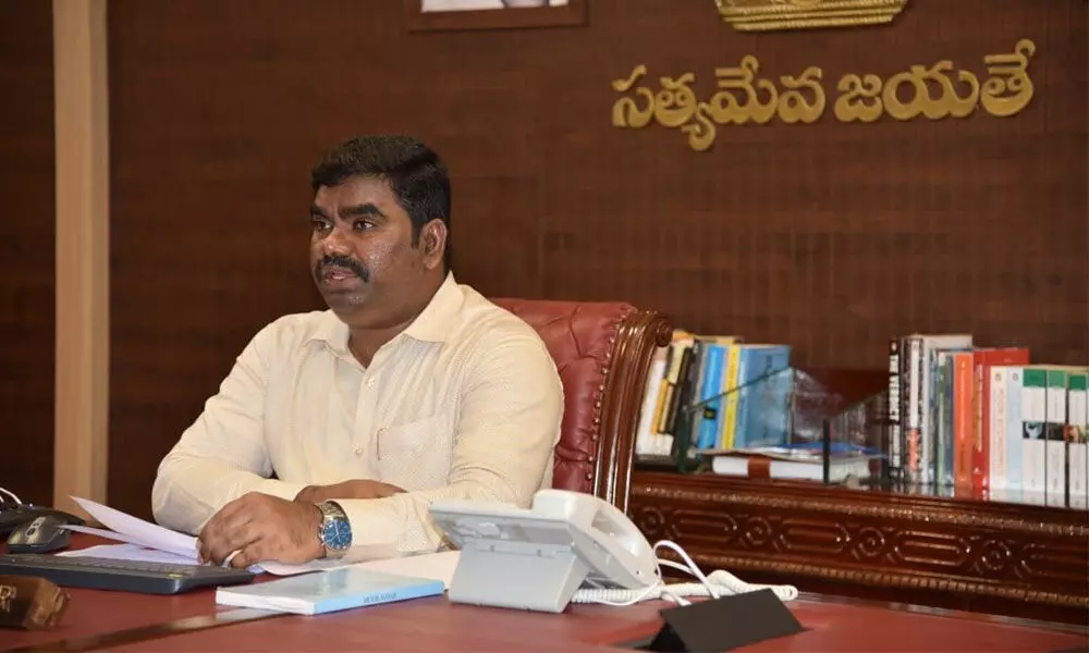 District Collector G Veera Pandian holding a meeting with officials from his camp office on Mana Badi-Nadu Nedu works in Kurnool on Wednesday.