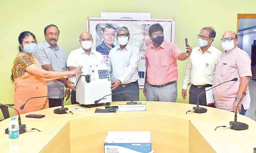 LRG students donate oxygen concentrators to JNTU