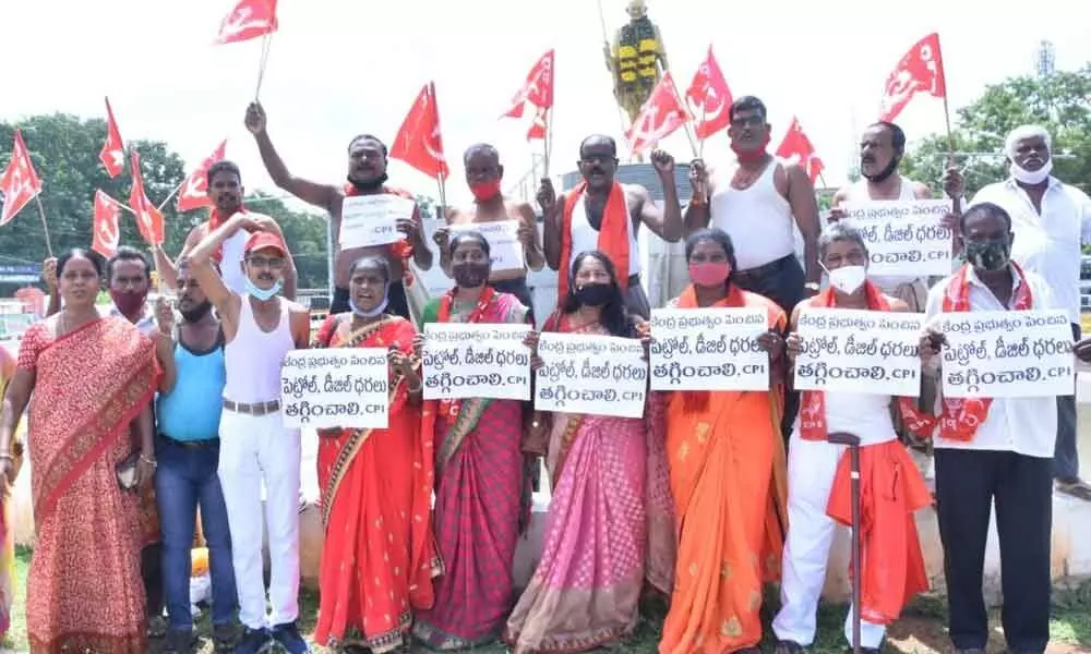 CPI leaders staging dharna in front of Gandhi statue in Chittoor on Friday