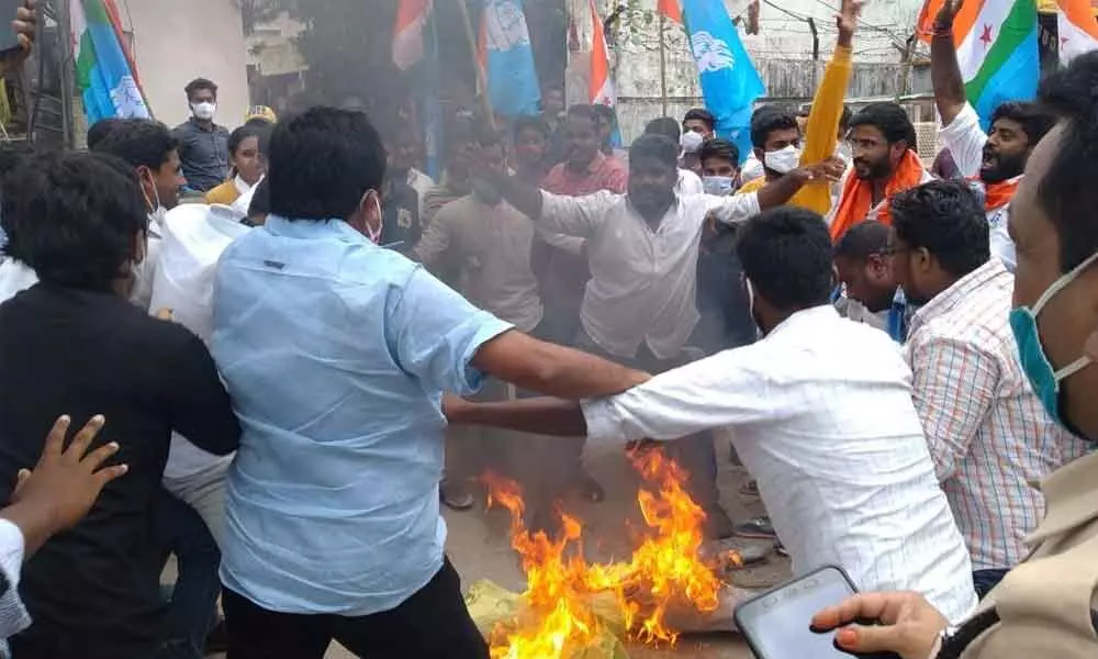NSUI Warangal district president Pallakonda Sathish during a protest aganist Minister Niranjan Reddy in Warangal on Saturday