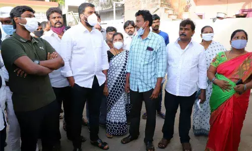 Minister for Water Resources Dr P Anil Kumar Yadav interacting with people of 51st division in Nellore on Saturday