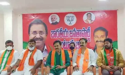 Rajya Sabha member GVL Narasimha Rao addressing a meeting at the BJP office in Guntur on Saturday