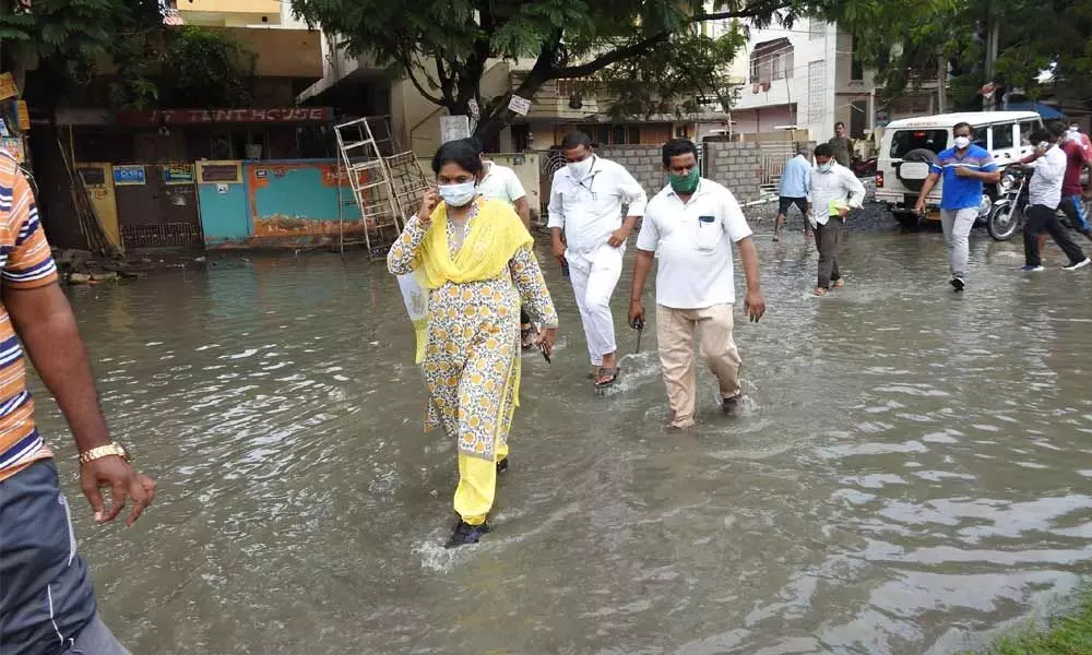 GMC Commissioner Challa Anuradha visiting rain-hit areas in Guntur on Sunday
